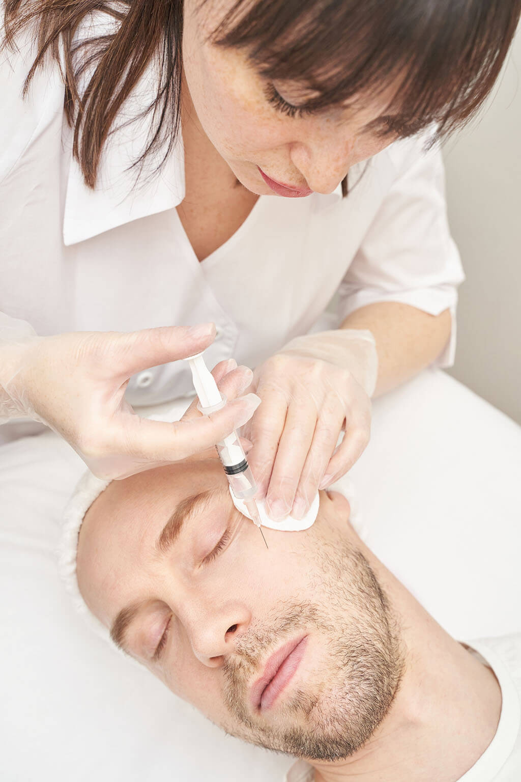 Man getting botox injection at Omnia Integrative Health & MedSpa in West Lawn, PA
