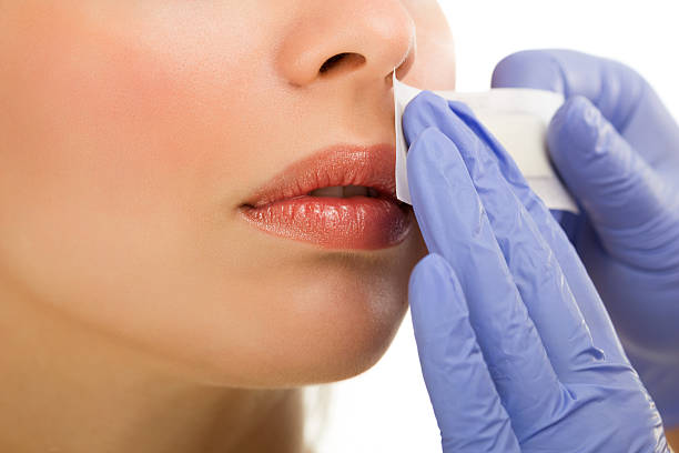 young woman reciving facial epilation