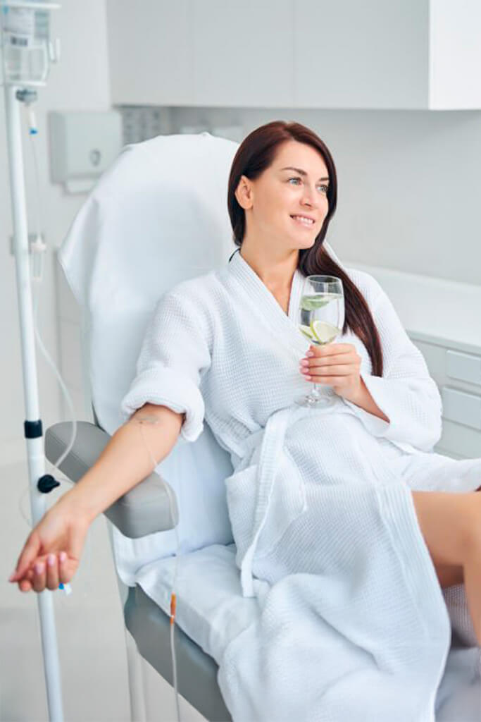 Woman getting IV Treatment at Omnia Integrative Health & MedSpa in West Lawn, PA
