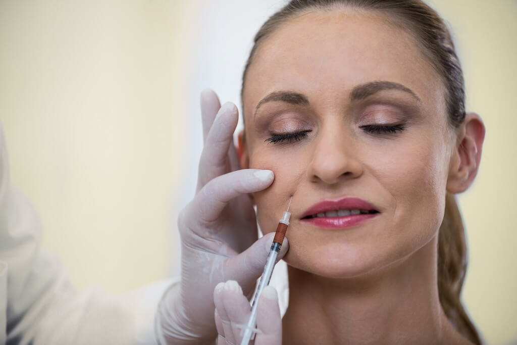 woman-receiving-botox-injection Woman getting PRF EZ Gel proceedure